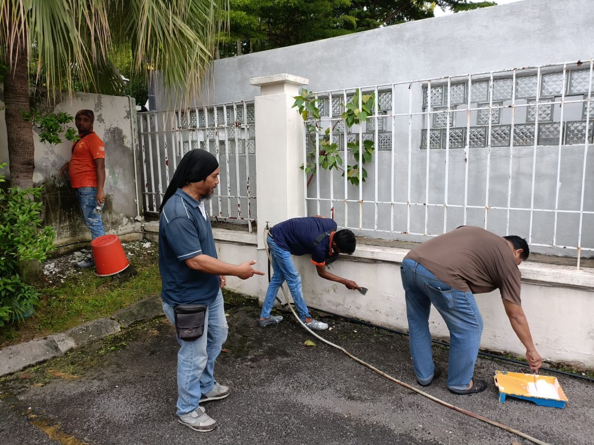 Rotol Group team members washing, scraping and repainting the boundary wall at the Kiwanis Down Syndrome Foundation - National Centre (Malaysia) on 16 May 2026.